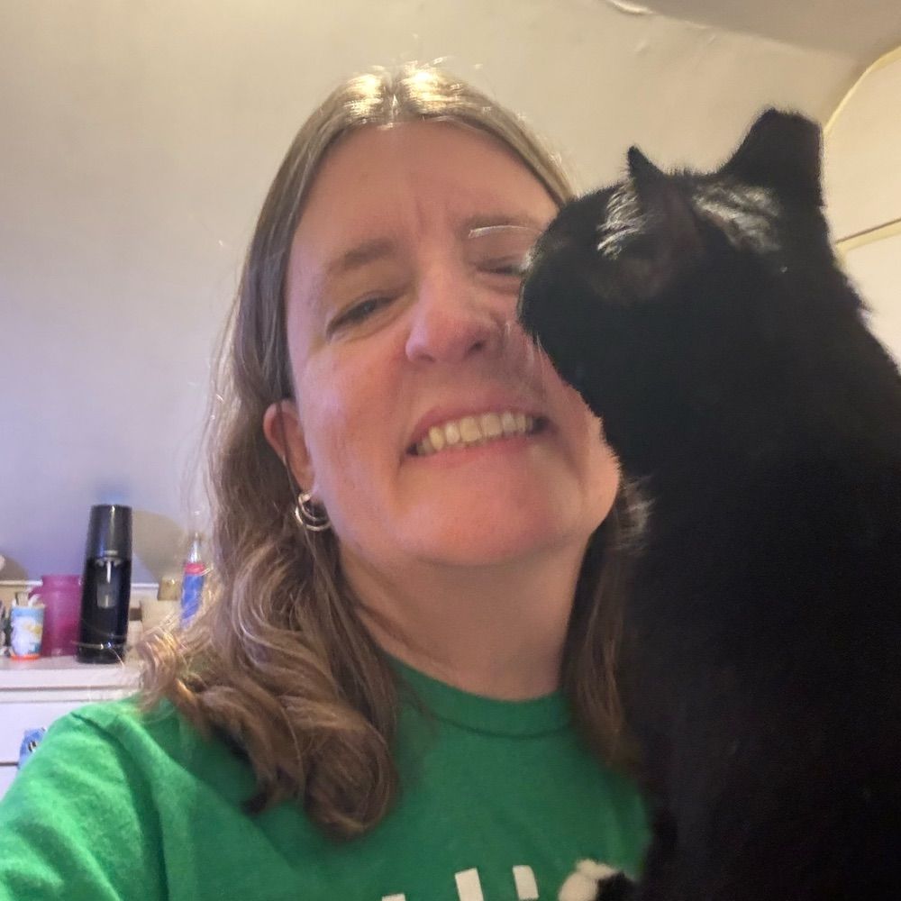 Liz Danner (she/they)