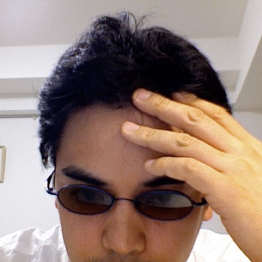 Tsutomu YANO