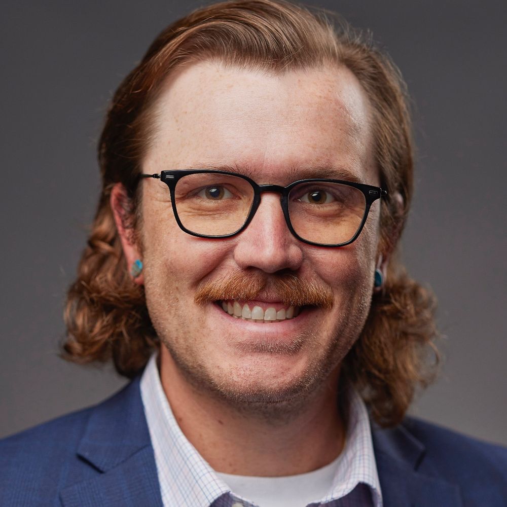 J. Tom Mueller