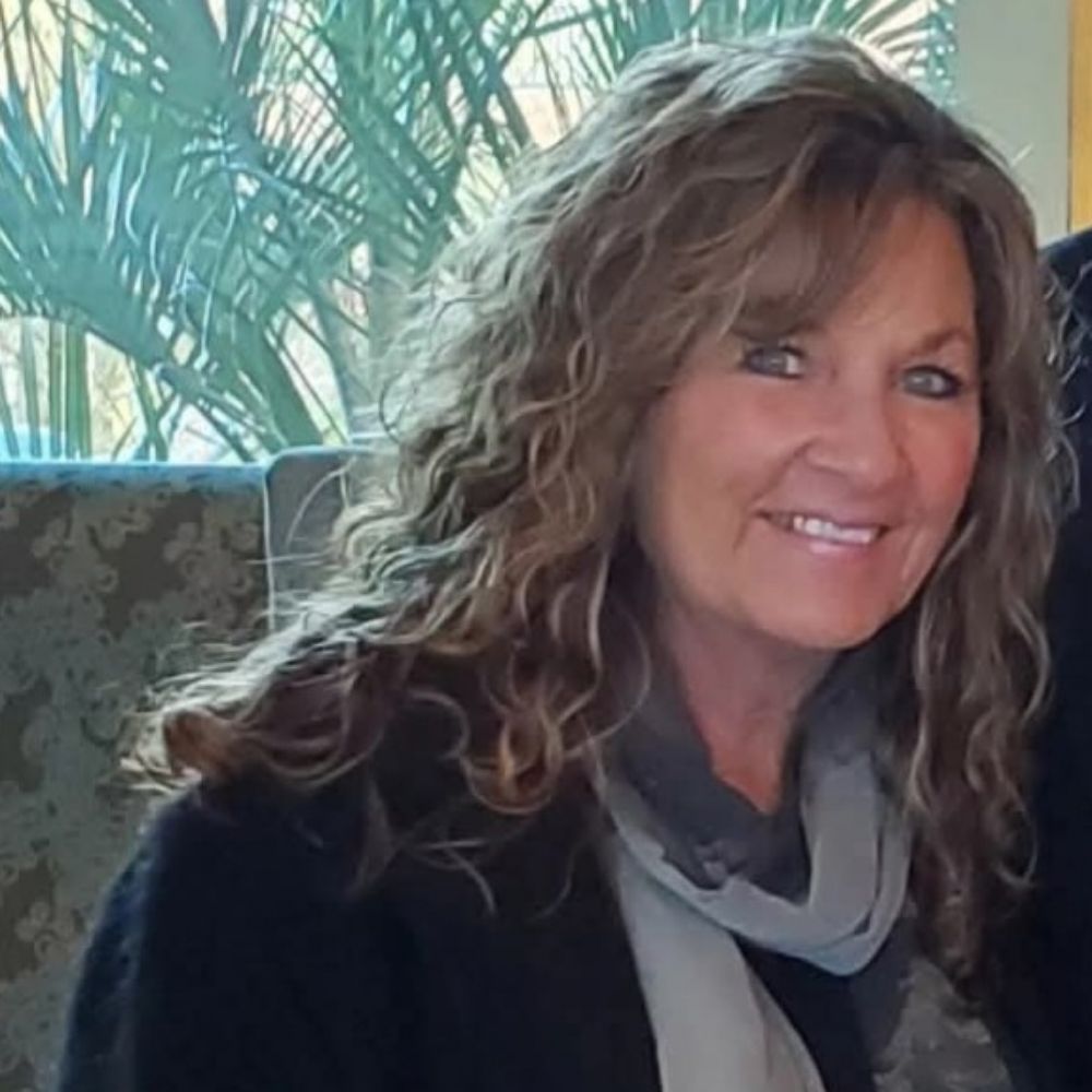 Shari M Greene