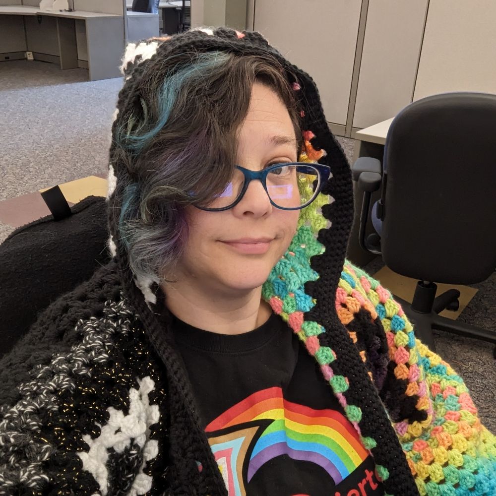 Erin Howell Sharpe (she/they)