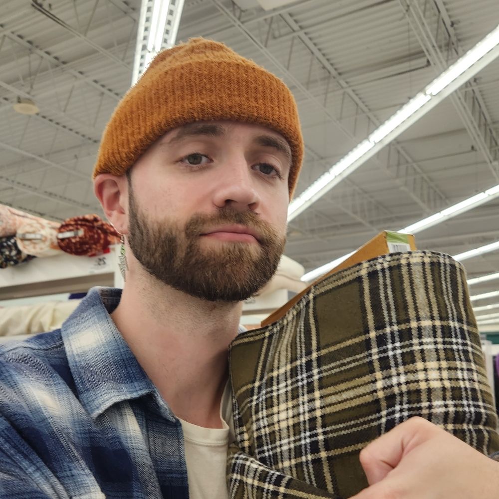 owns an orange hat