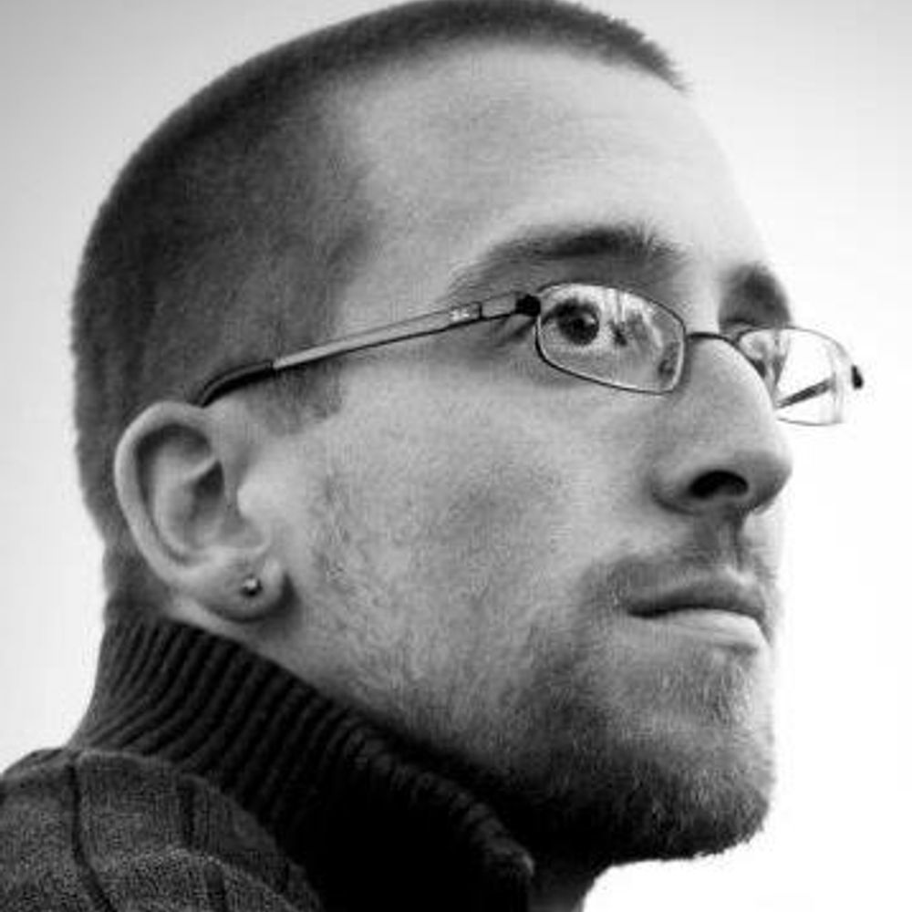 Ryan J. Rhoades