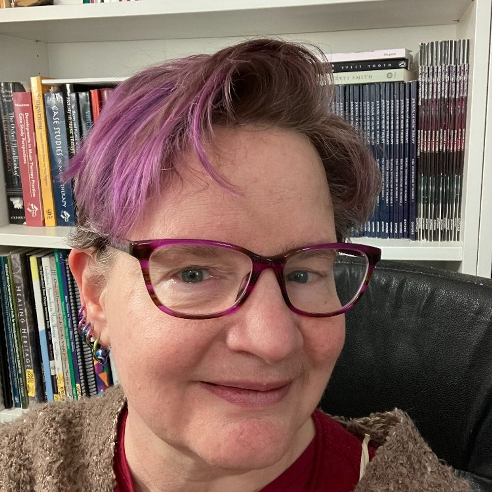 Lynn Gumert (they/them)