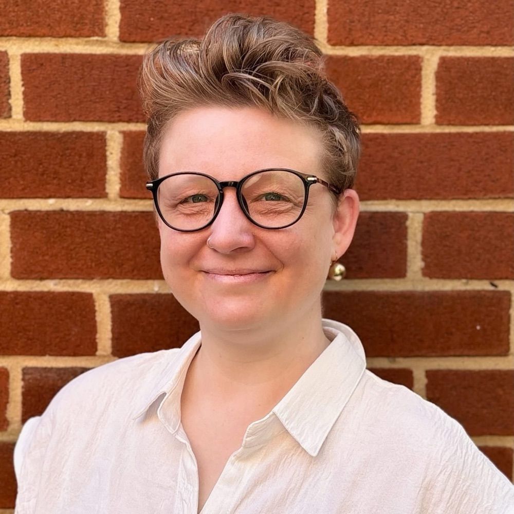 Molly Horton Booth (they/she)
