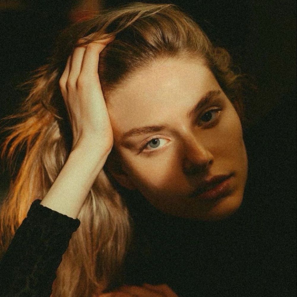 L.