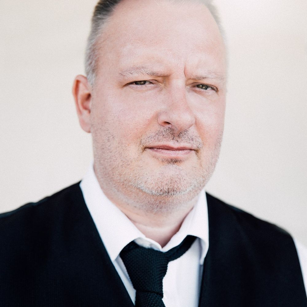 Dean M Drinkel