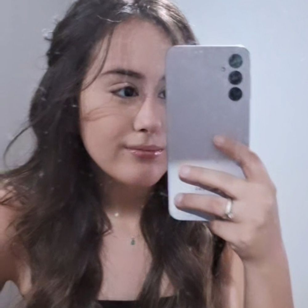 K.
