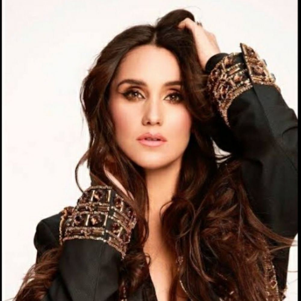 Dulce María (DM)