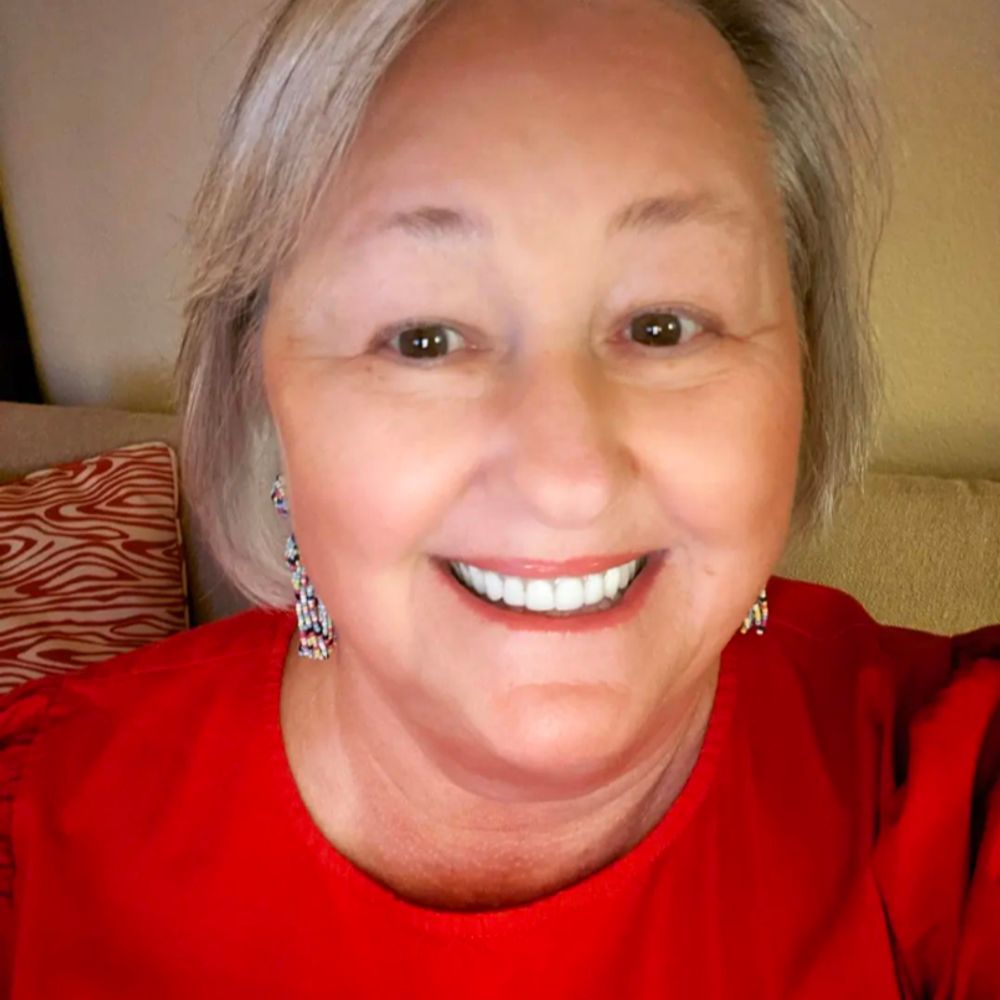 Catherine E Holladay