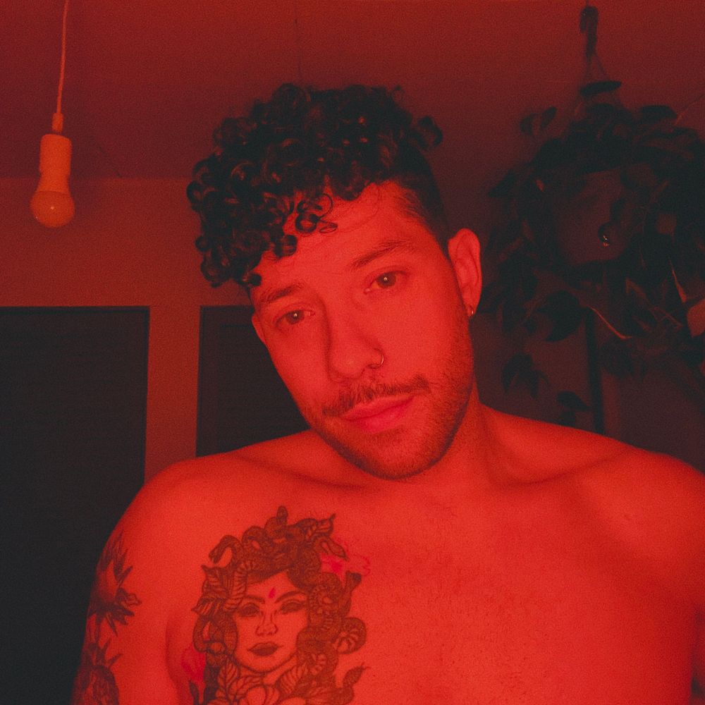 The Man With Flower Tattoos