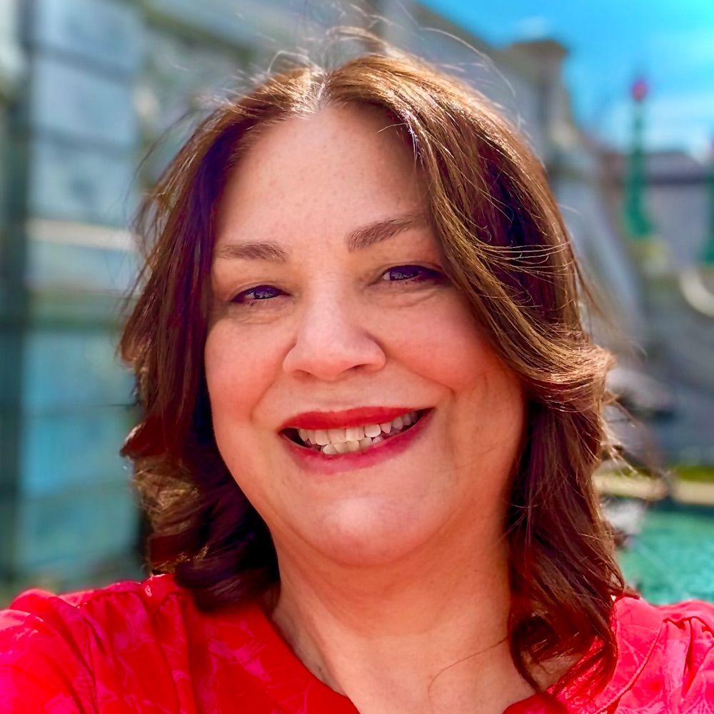 Gina M