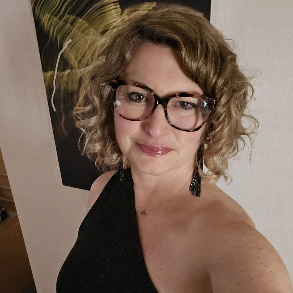 Andrea Carey (she, her)