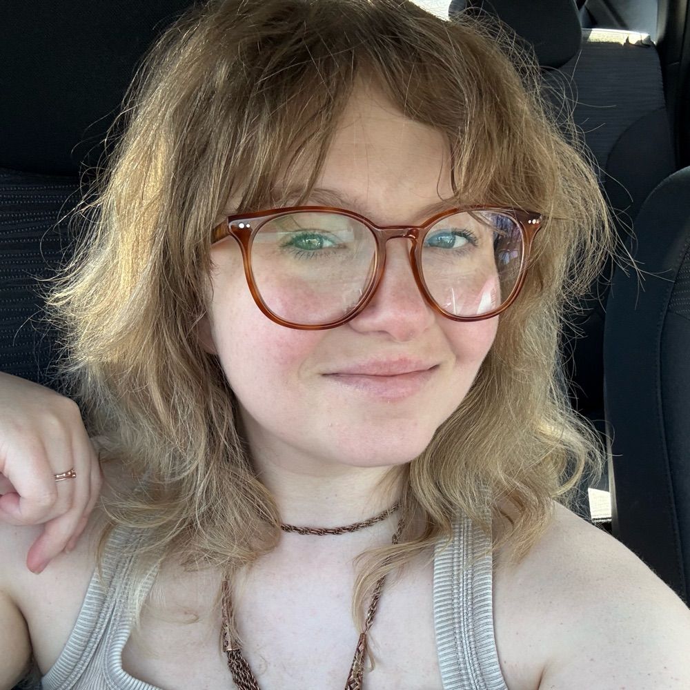 A.M. Weber (she/they)
