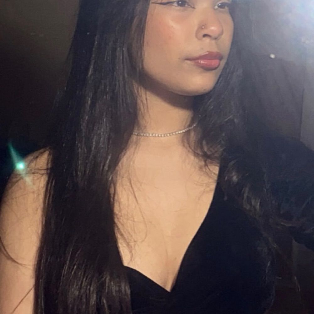 T.