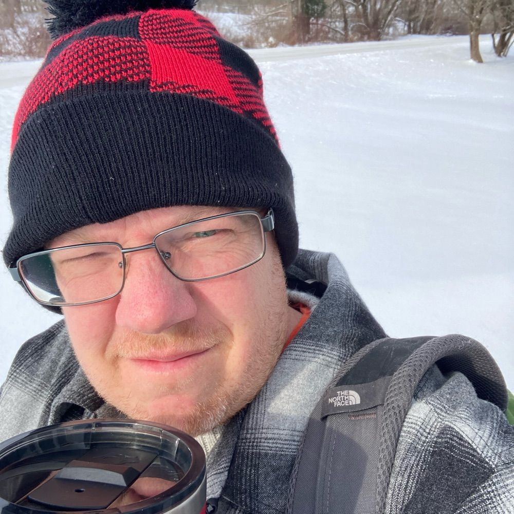Chris Karmosky (He/Him)
