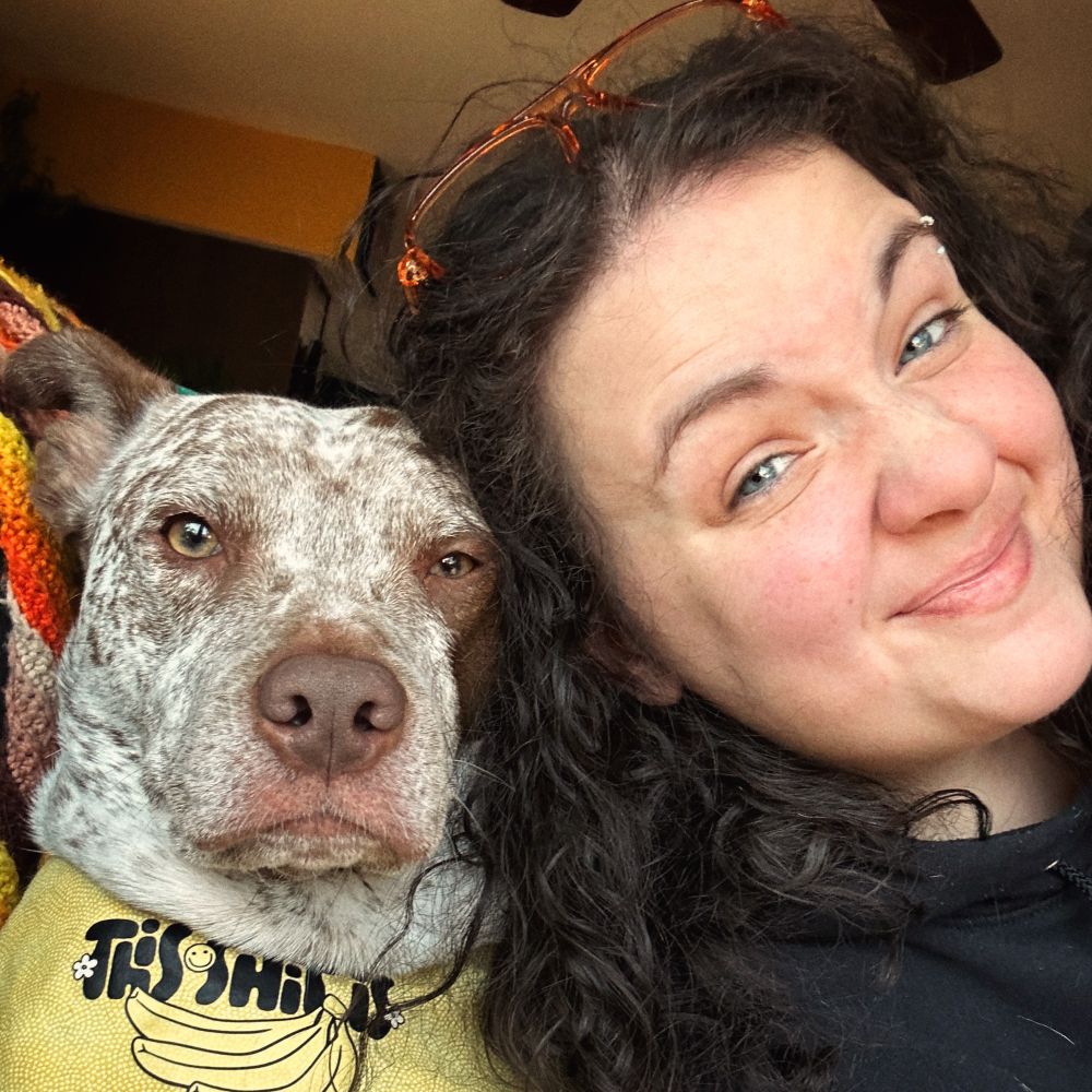 Ellen of Imaginarium Arts (and her dog Bella) She/Her
