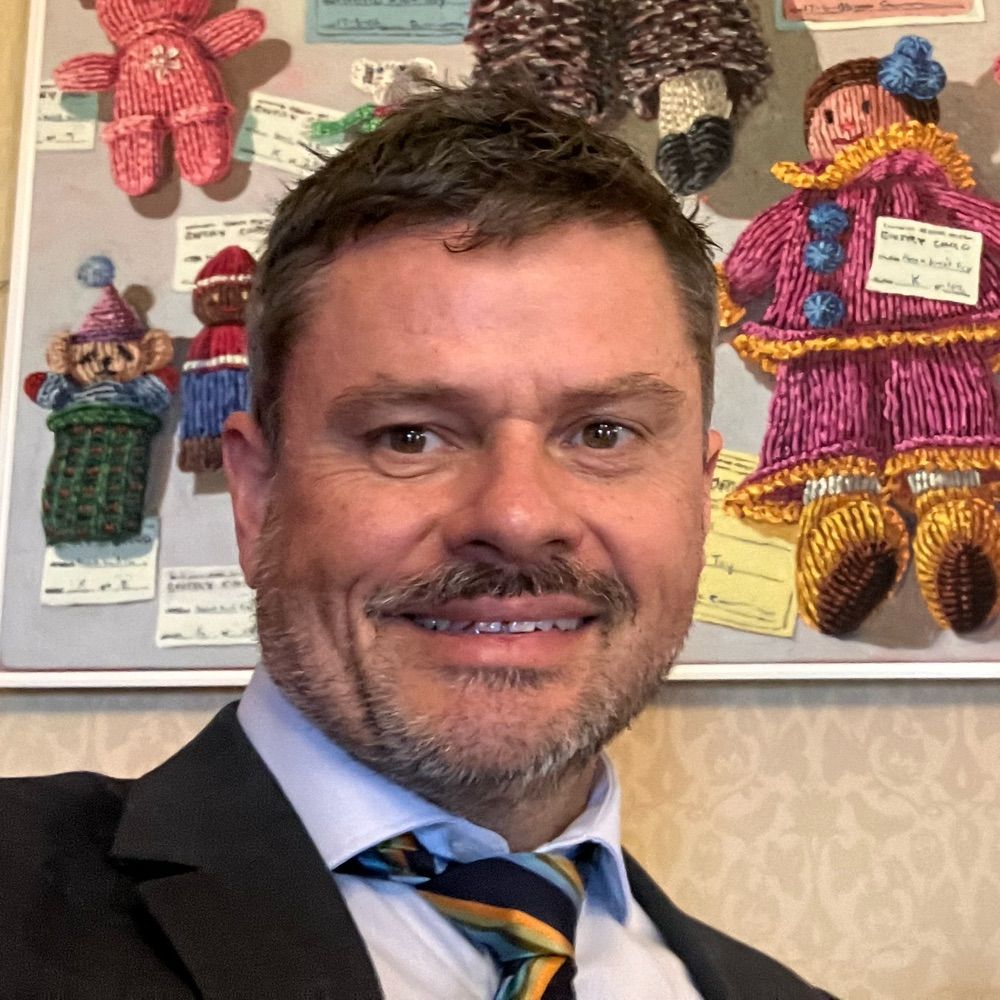 Prof Daryl Higgins (he/him)