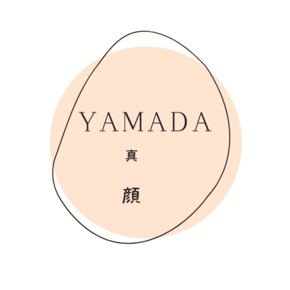 山田 真顔