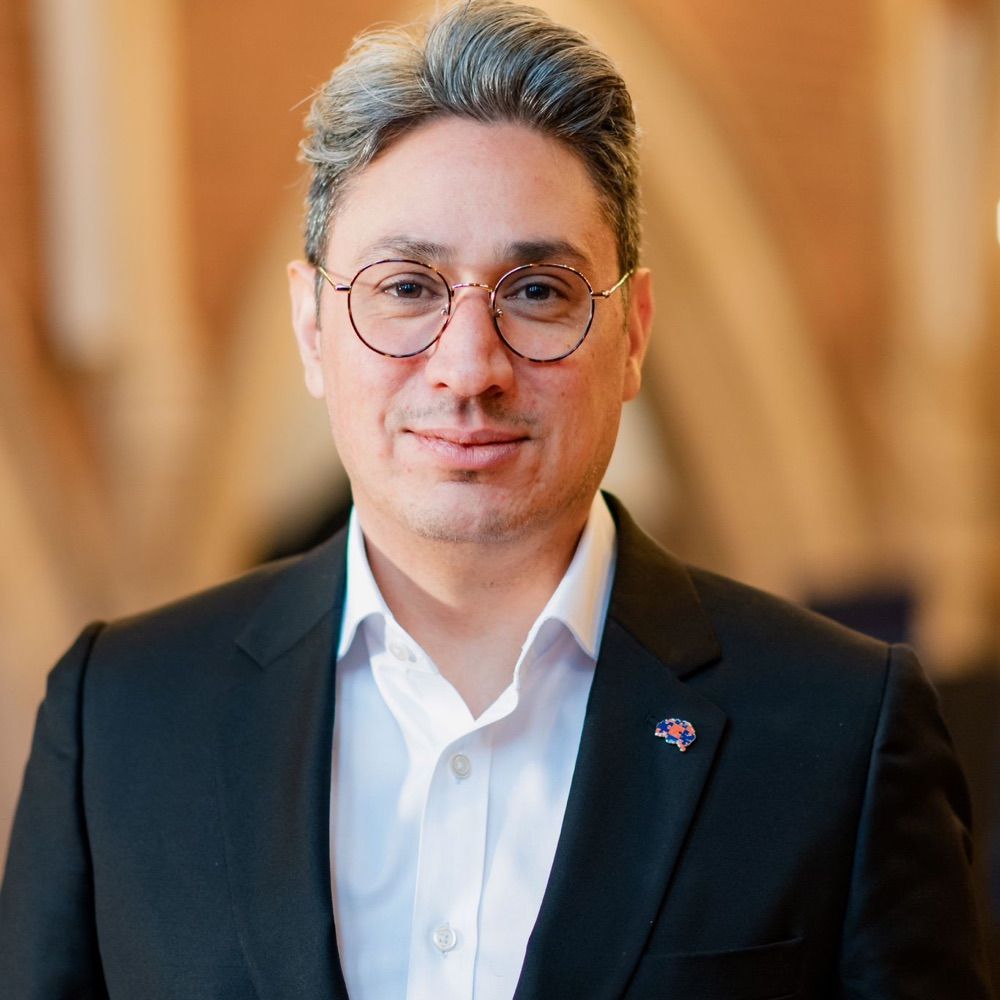 Prof Benedict D Michael FRCP PhD