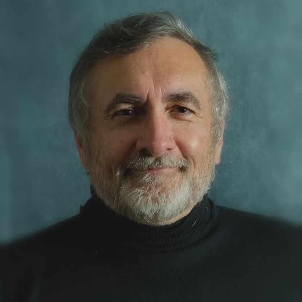 Alan E Mason
