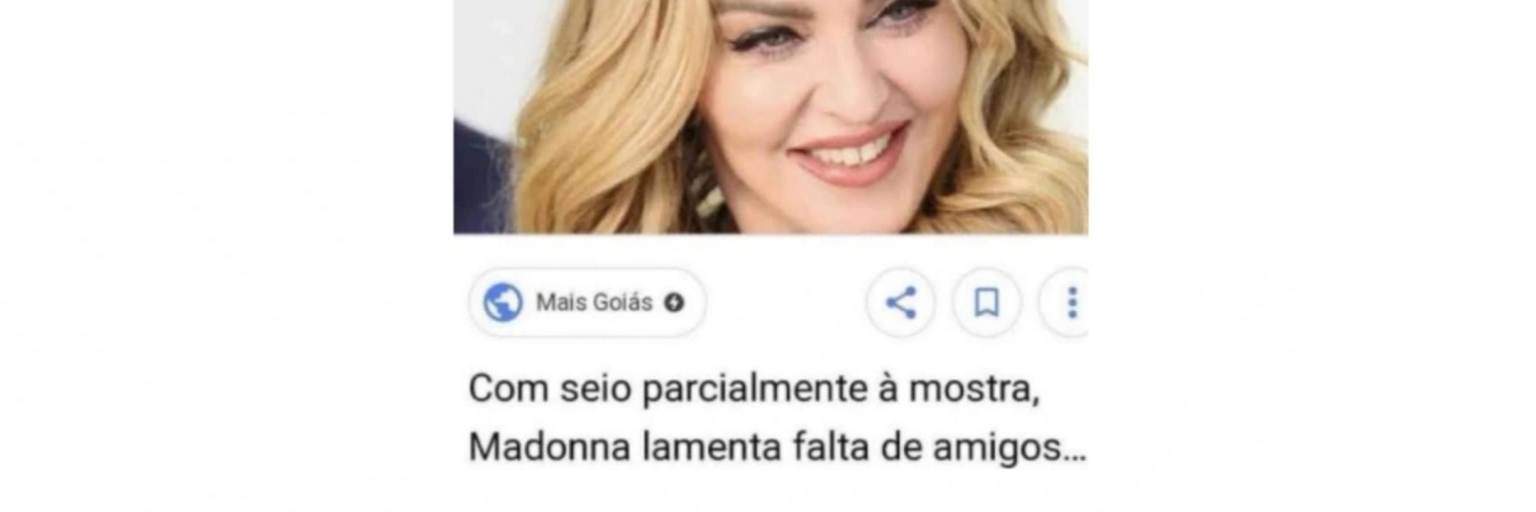 com seio parcialmente à mostra, madonna lamenta falta de amigos