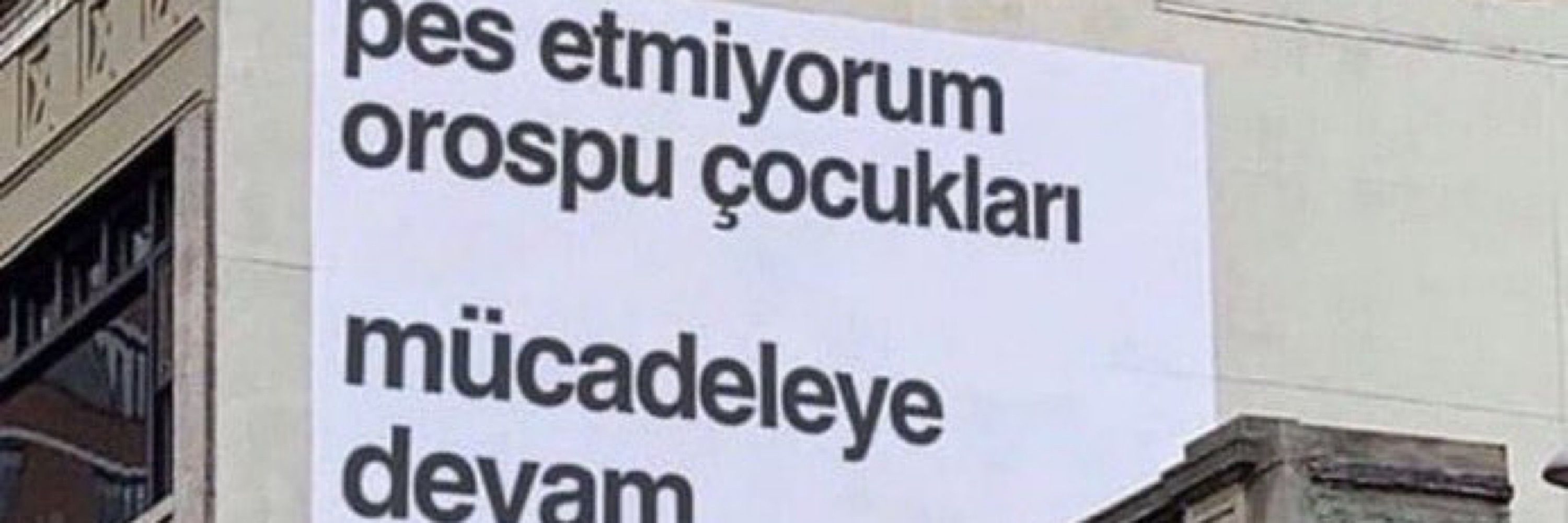 M.