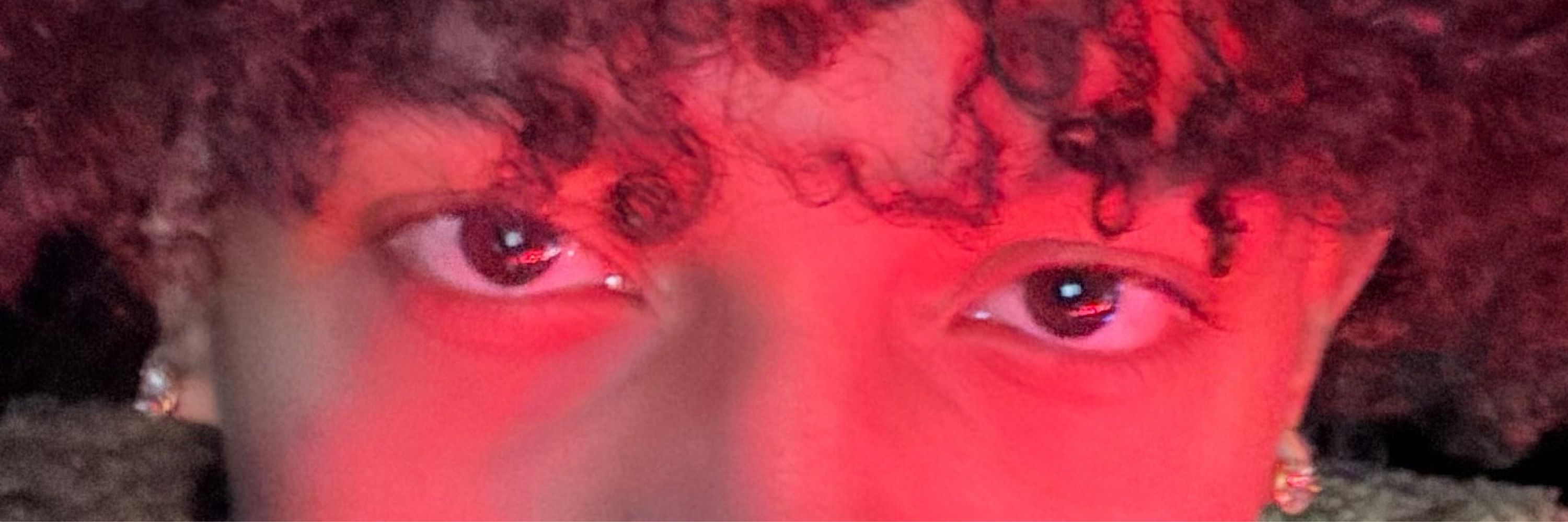 J.