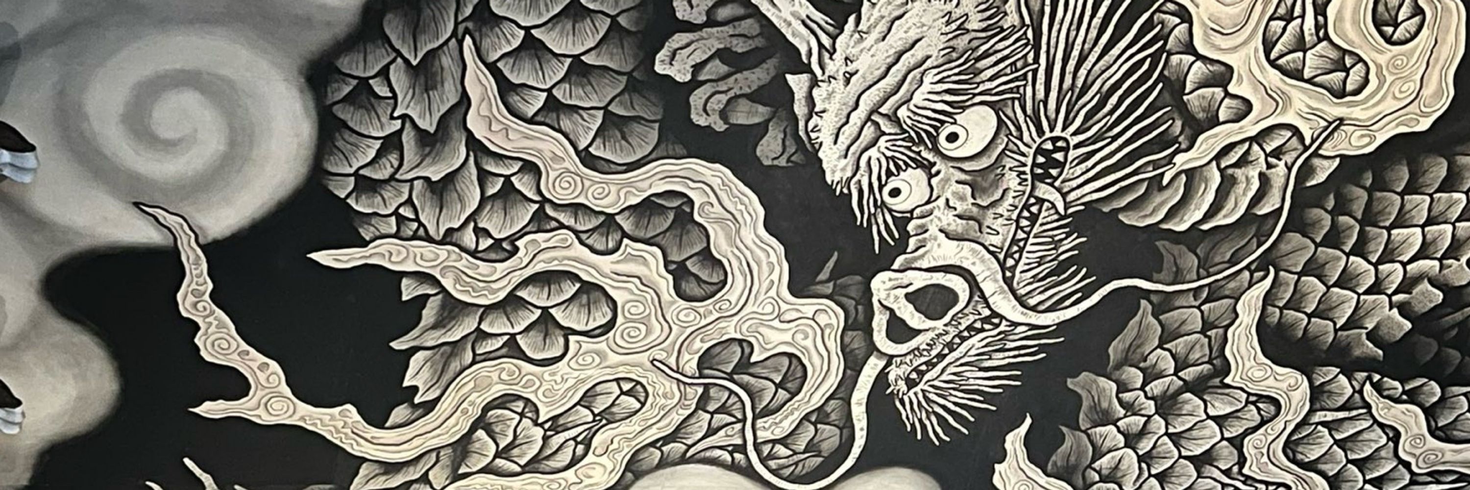 中間　光明