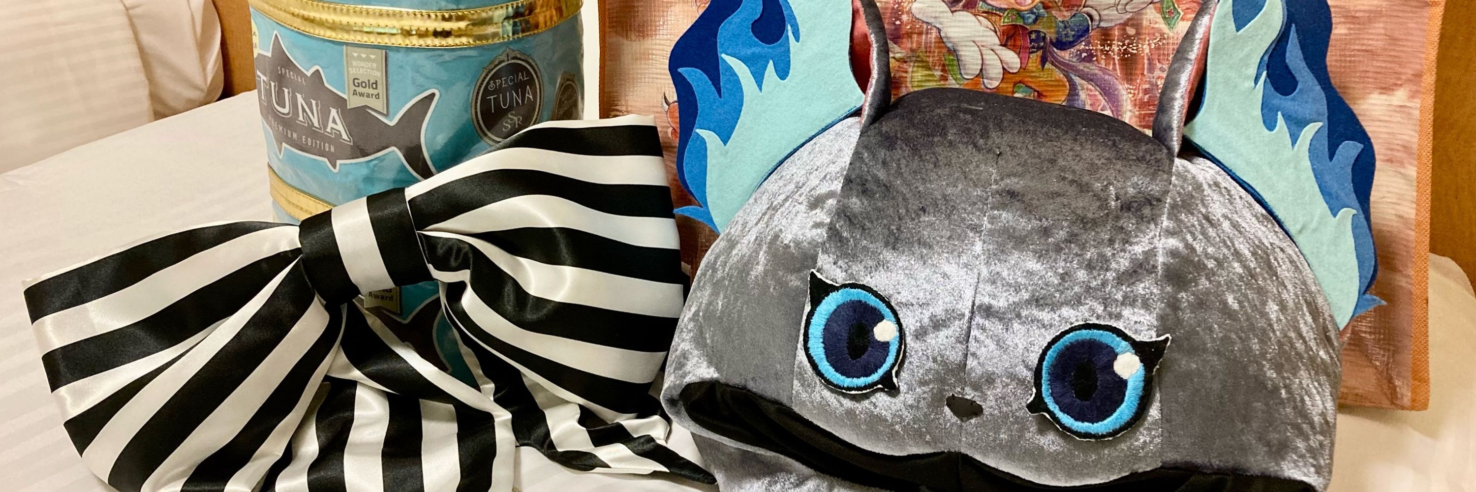 ツナ缶をしょった灰猫🐈‍⬛🐟