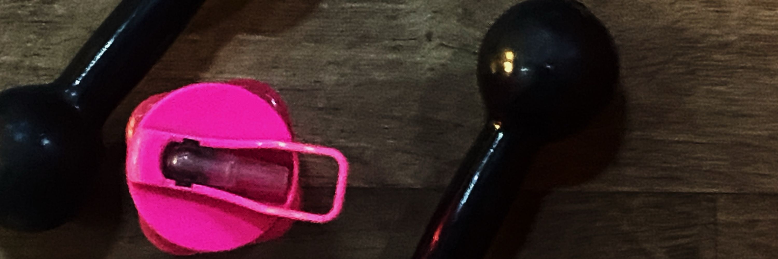 T.
