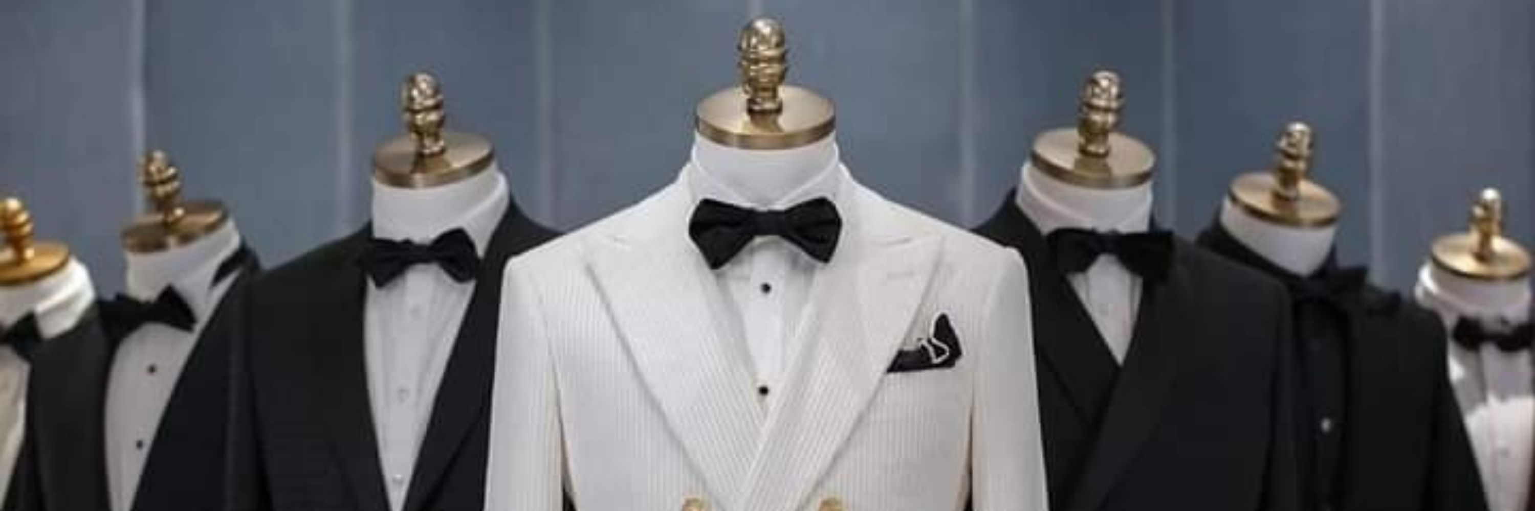 Q The Tailor