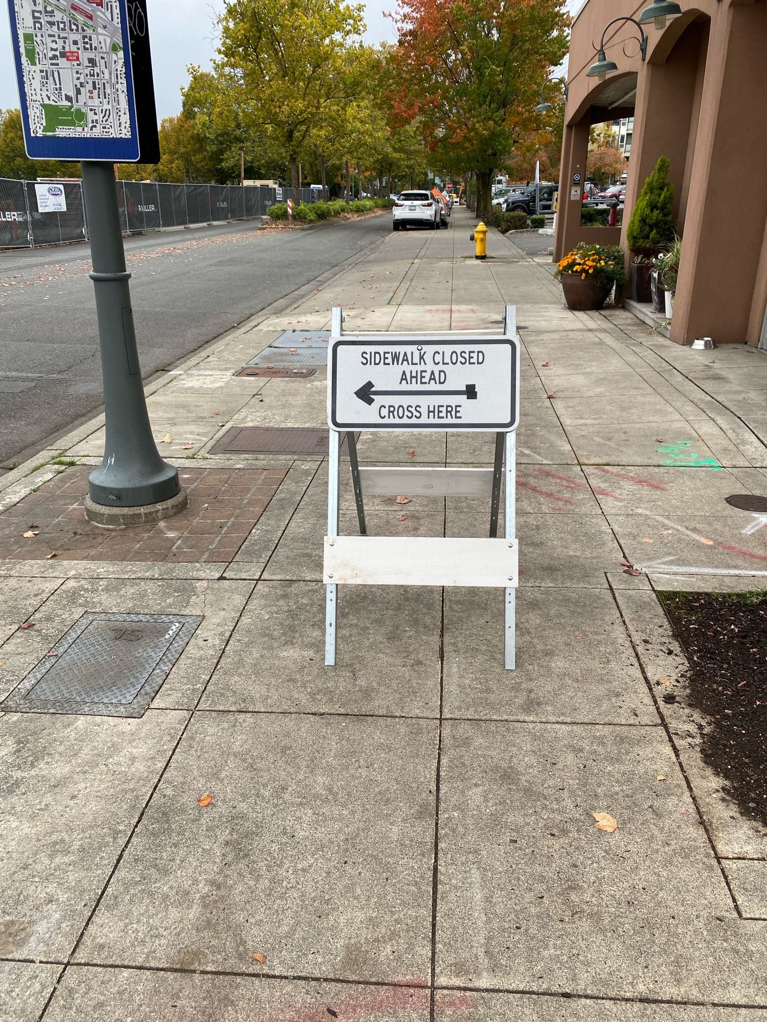 Picture of a sidewalk closed sign