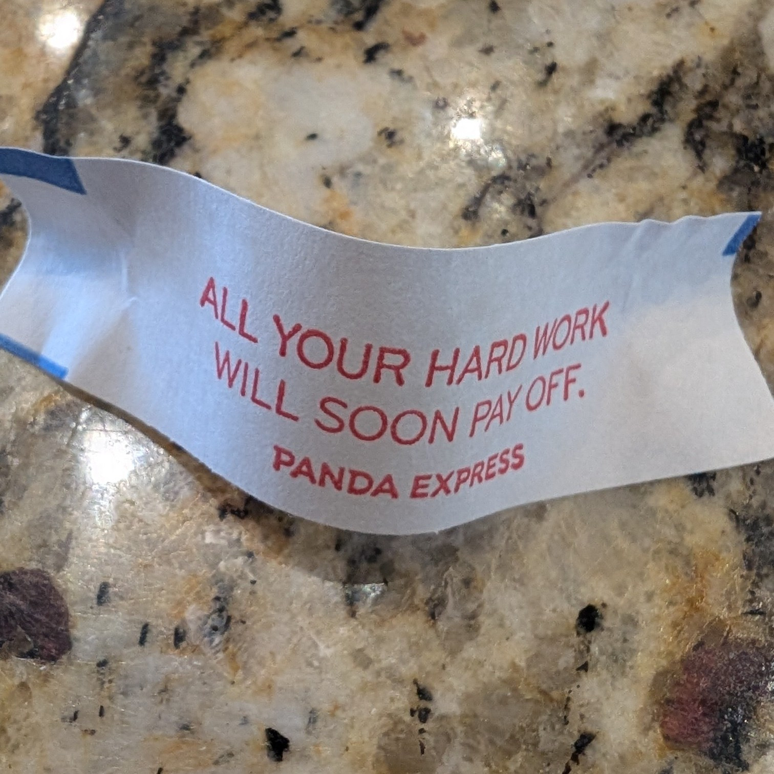 Fortune cookie that reads "All your hard work will soon pay off."