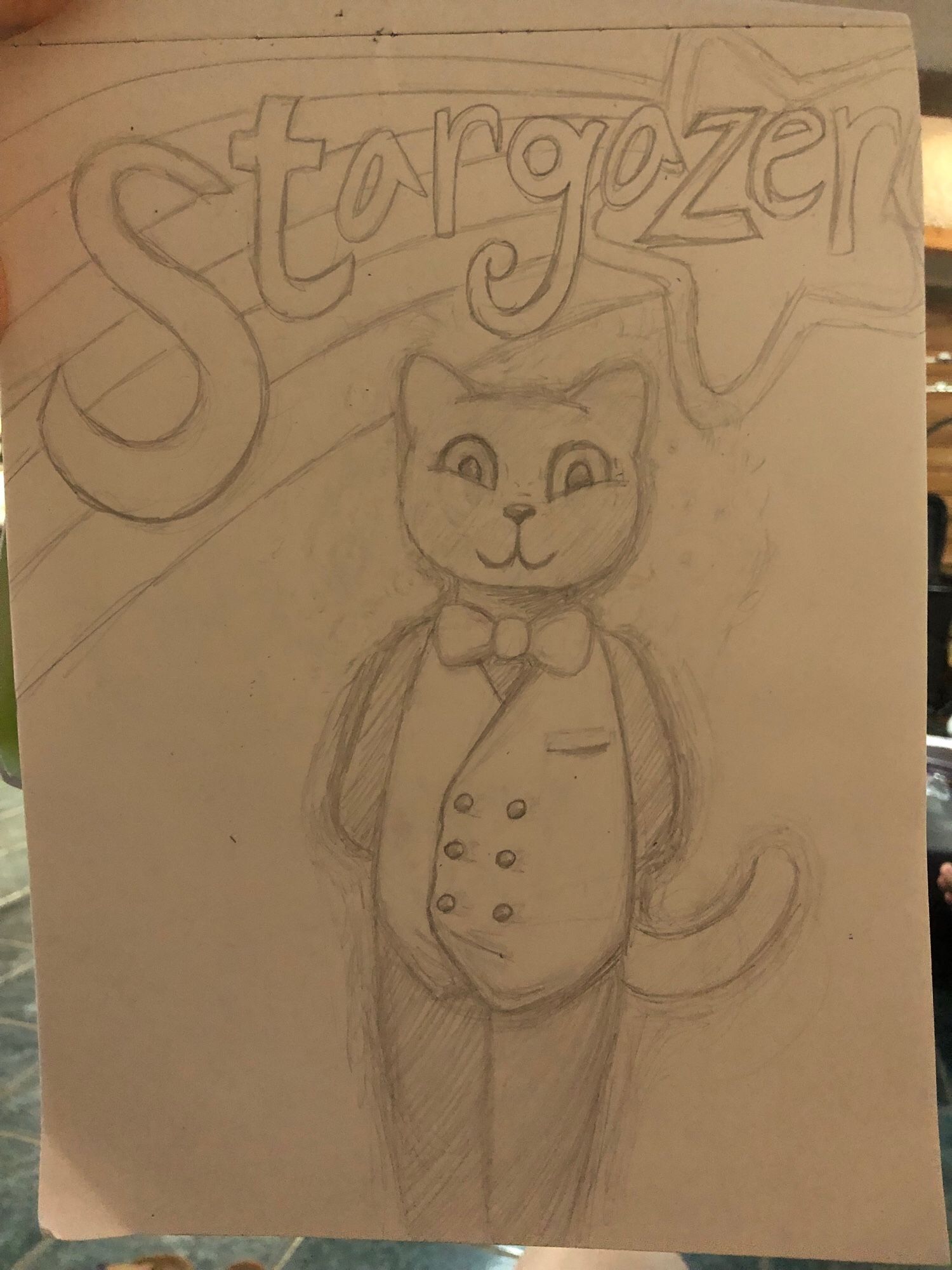 Word stargazer chasing a star with a rainbow flowing behind it
Anthropomorphic cat in a suit below the word looking at the camera
Arms behind his back