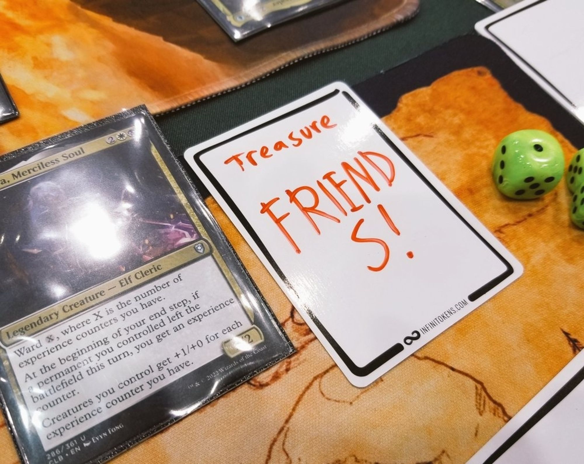 An InfiniToken dry erase treasure token that says "Friends!"