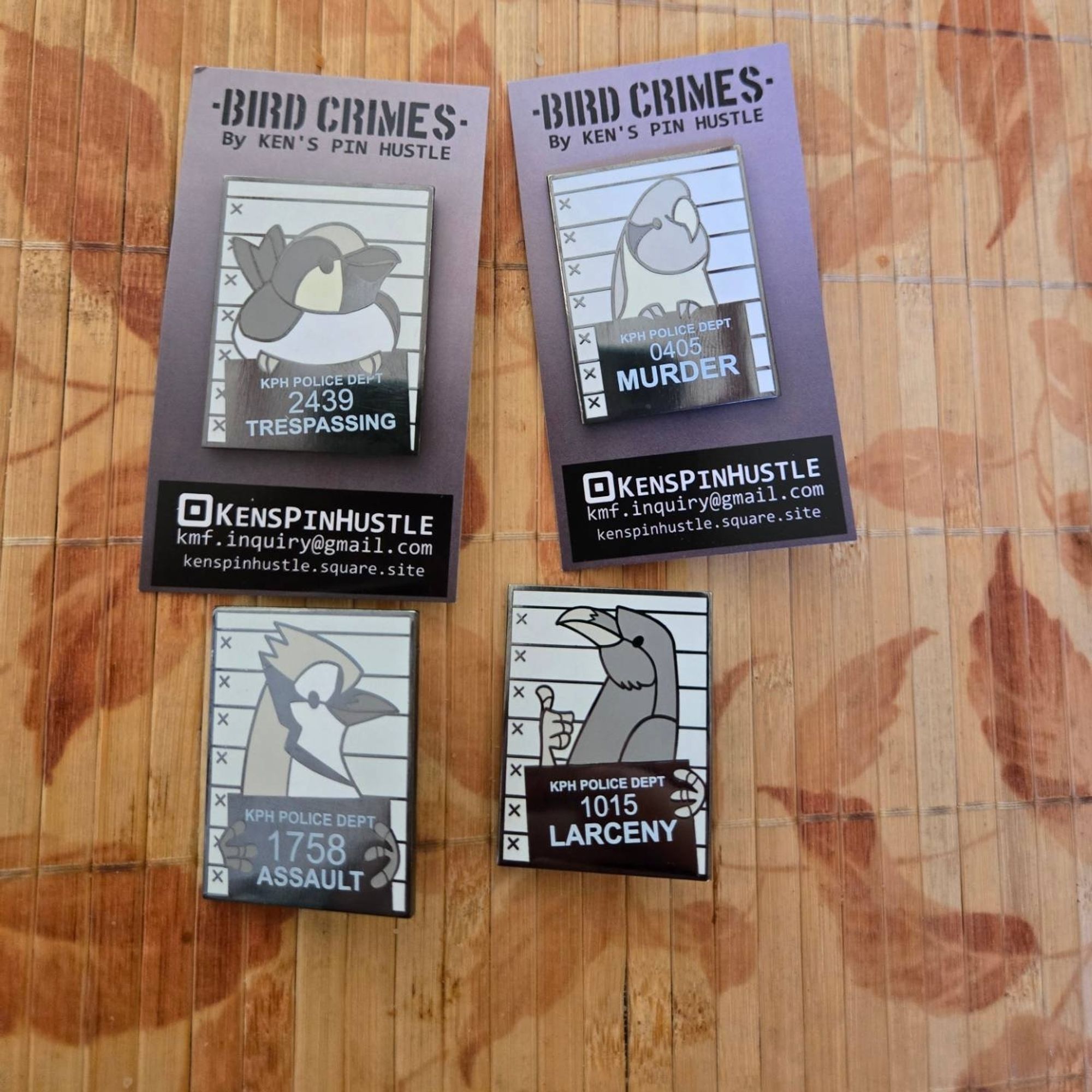 Bird Crimes pins