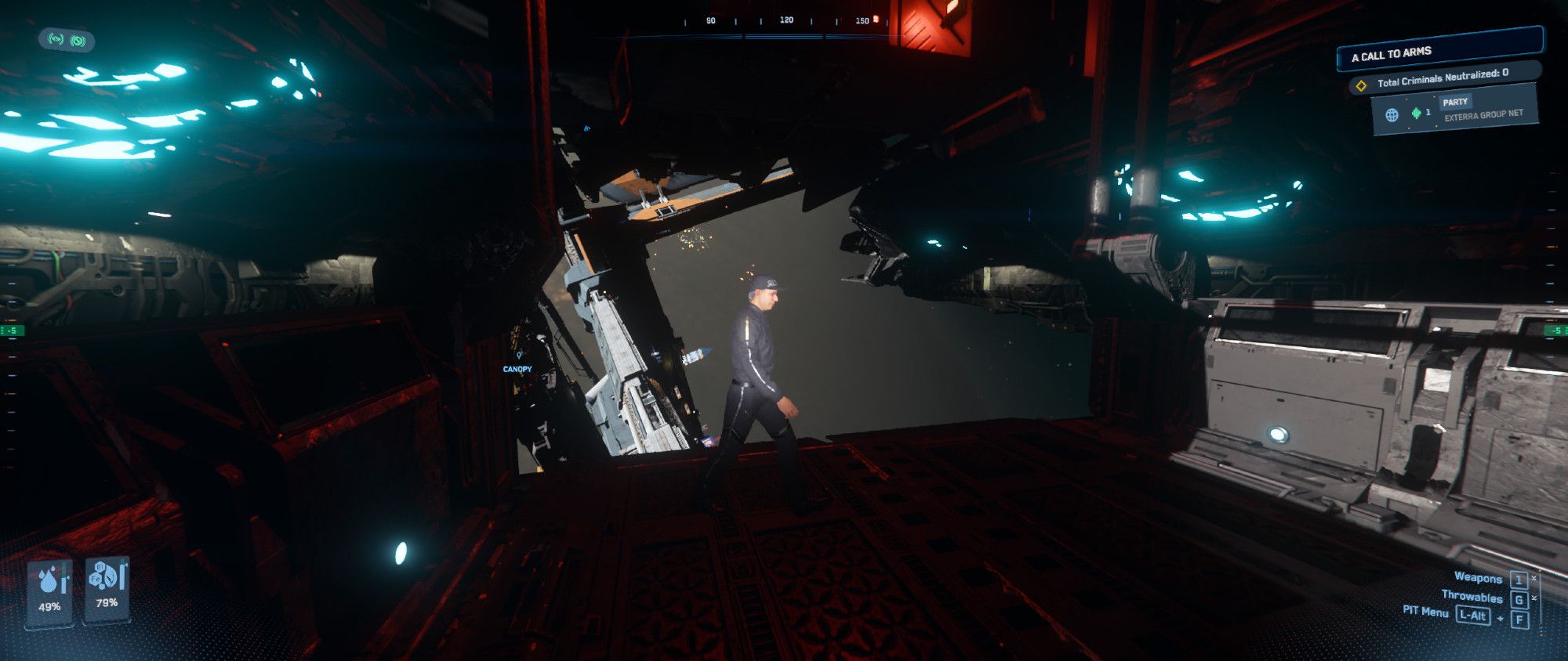 A lowered cargo bay of a derelict ship, exposed to the vacuum of space. A security team NPC is walking around the cargo bay without a space suit.