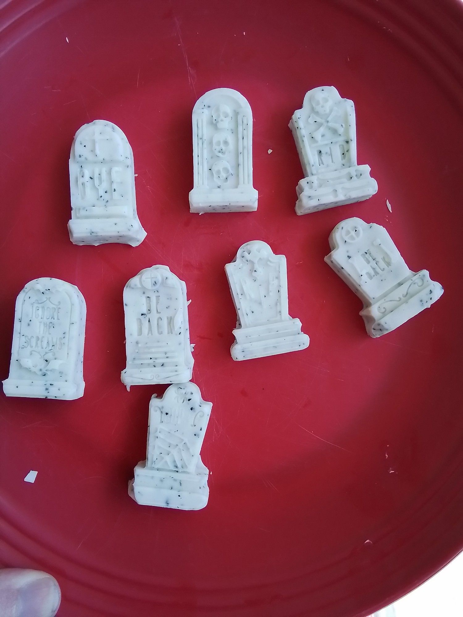 Cookies and cream candy tombstones. They're mostly white with black cookie flecks.