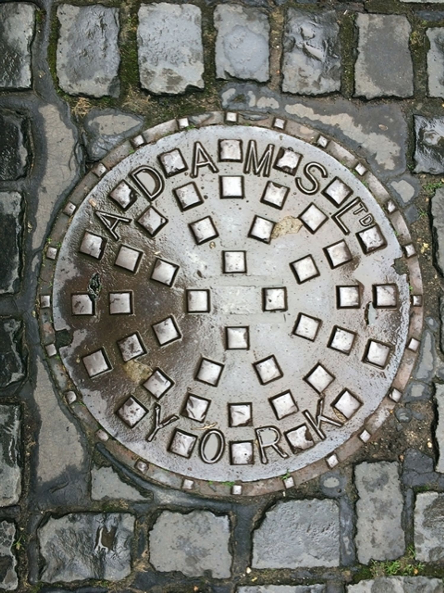 Adams manhole covet in Barker Lane in York