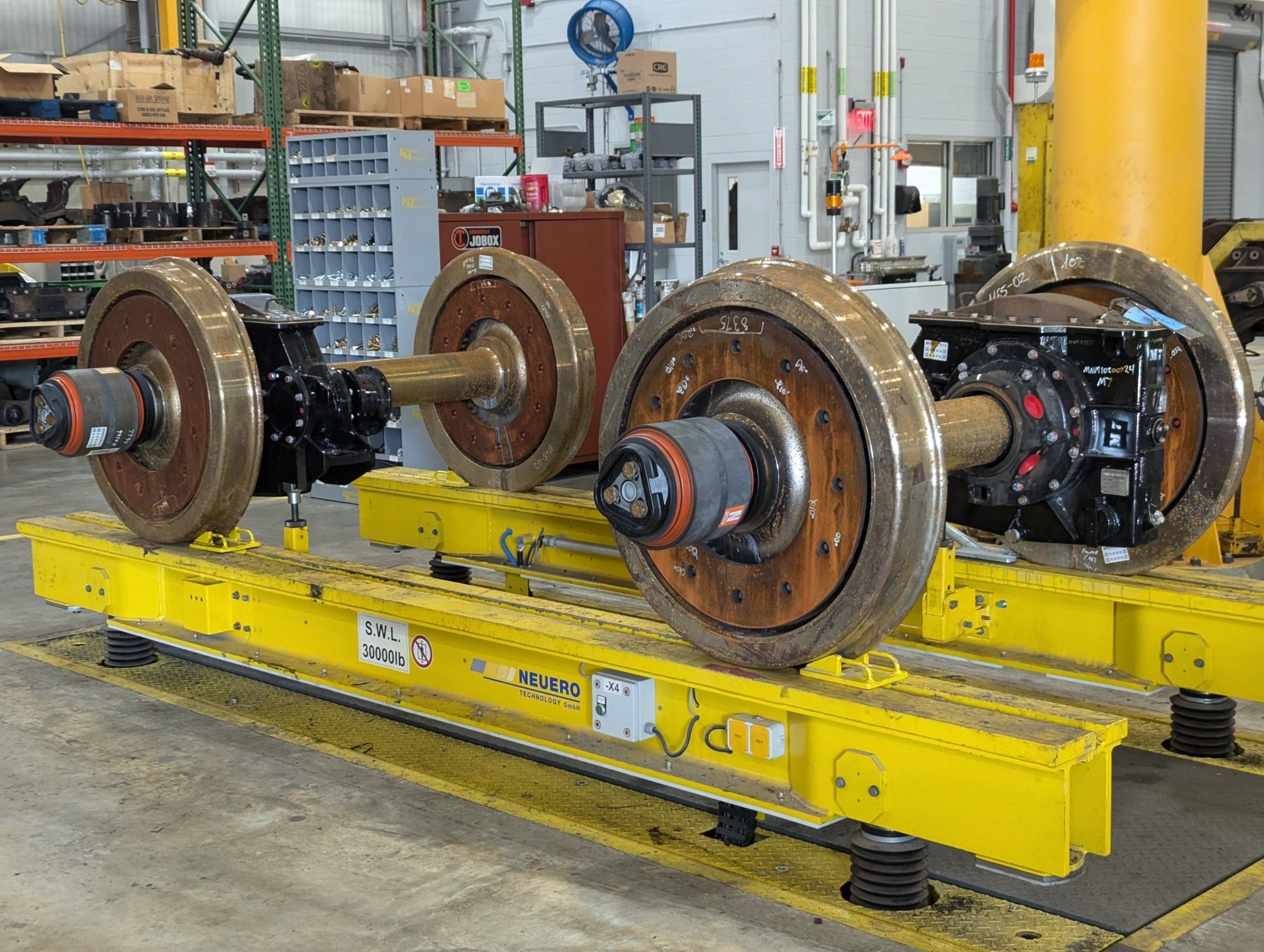 Close-up of wheels and an M7 EMU car