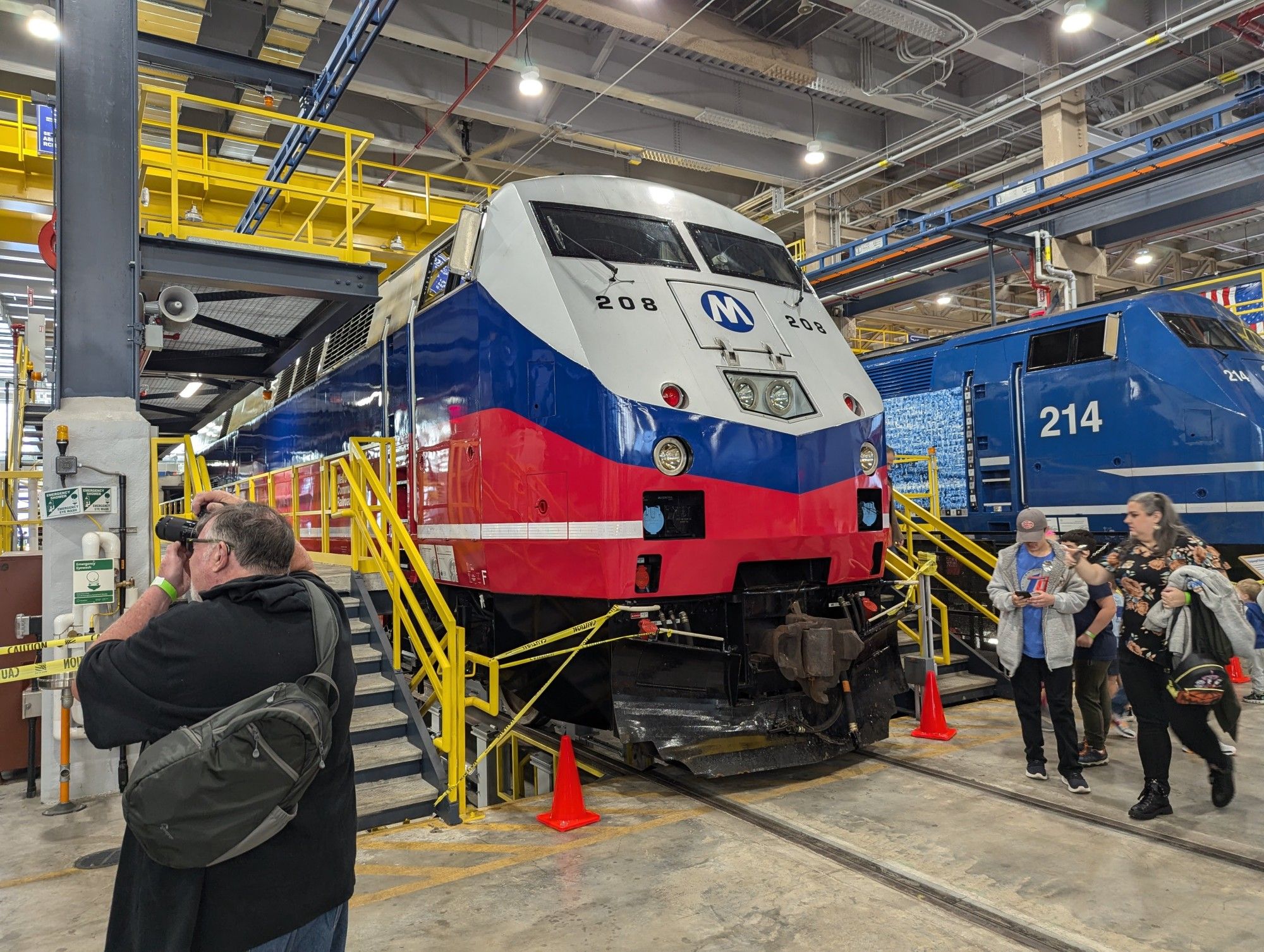 Metro North GE P32AC-DM Number 208, the "Beach Ball" paint scheme unit