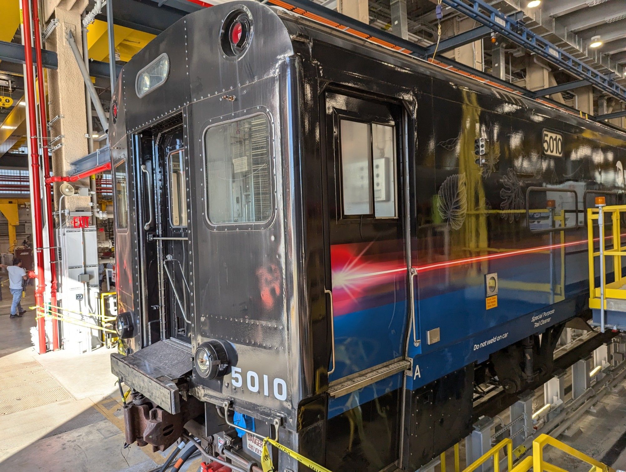 The blacked-out and laser-beam graphics on the Metro North "Laser Train" are such a vibe.