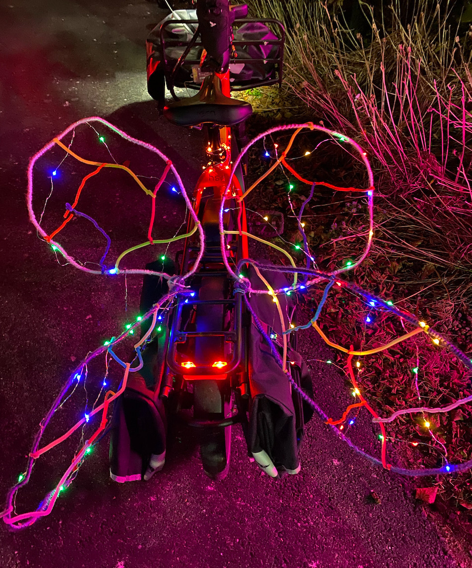 A Tern HSD bicycle decorated with wings and fairy lights to look like a butterfly. One of the many bikes that took to the streets of Halifax, Nova Scotia for the "ILightHFX" community bike ride