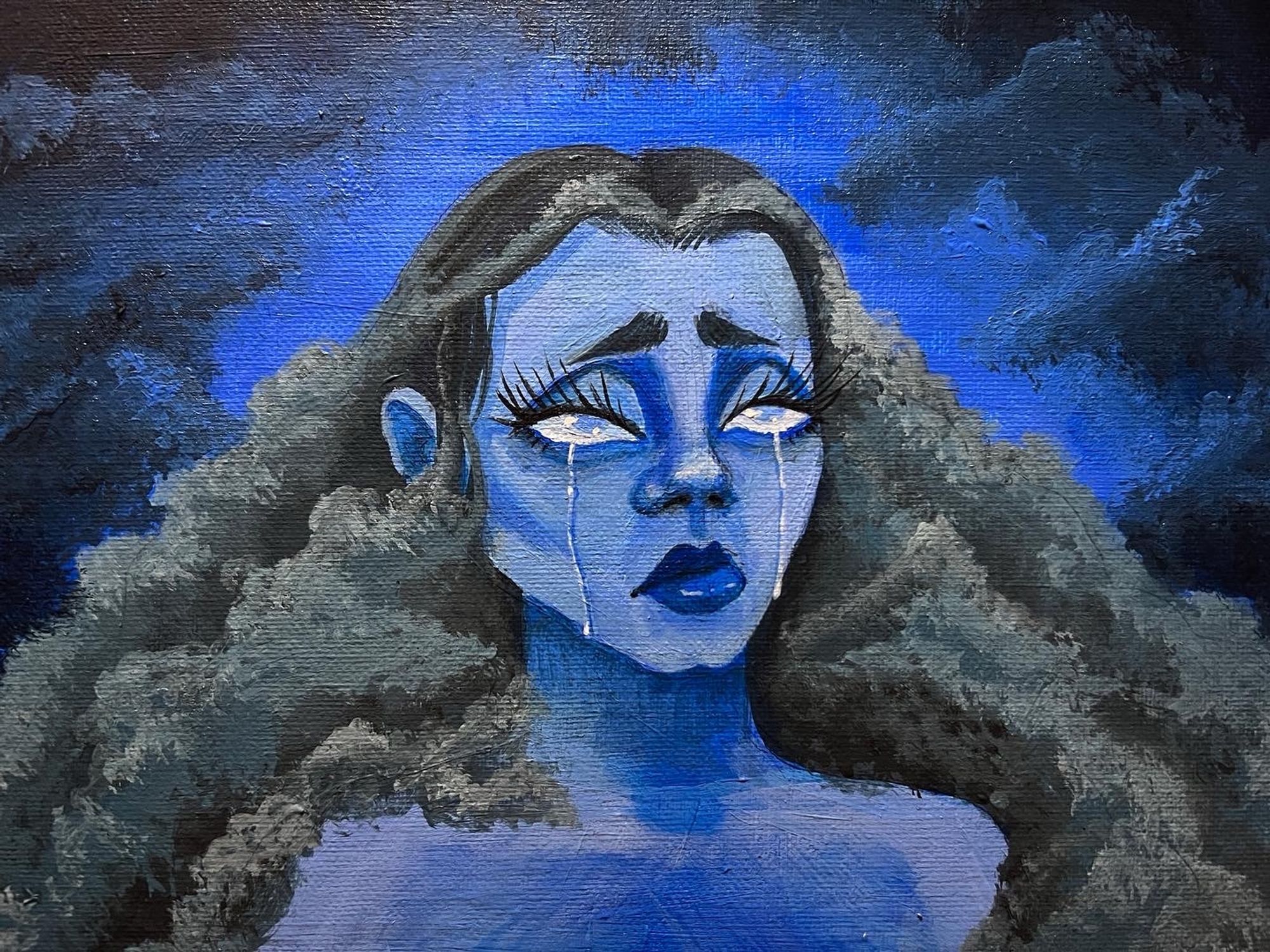 Acrylic Painting by ZoeTreez 

A mostly blue acrylic painting on a canvas. The painting is of a blue femme character. The blue femme character has a long, wispy eyelashes and heavy eyes. The figures hair is stormy and textured like the clouds in the background. Her eyes resemble raindrops within the clouds. Her expression is of a pouted lip and raised brows.