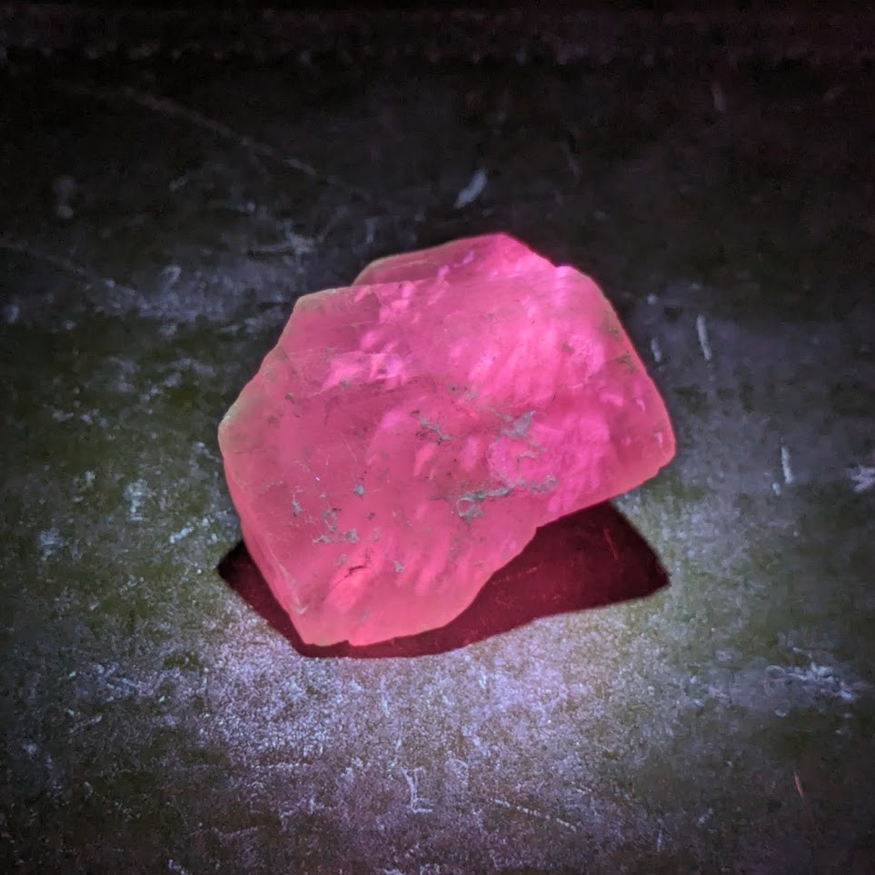 calcite glowing bright pink