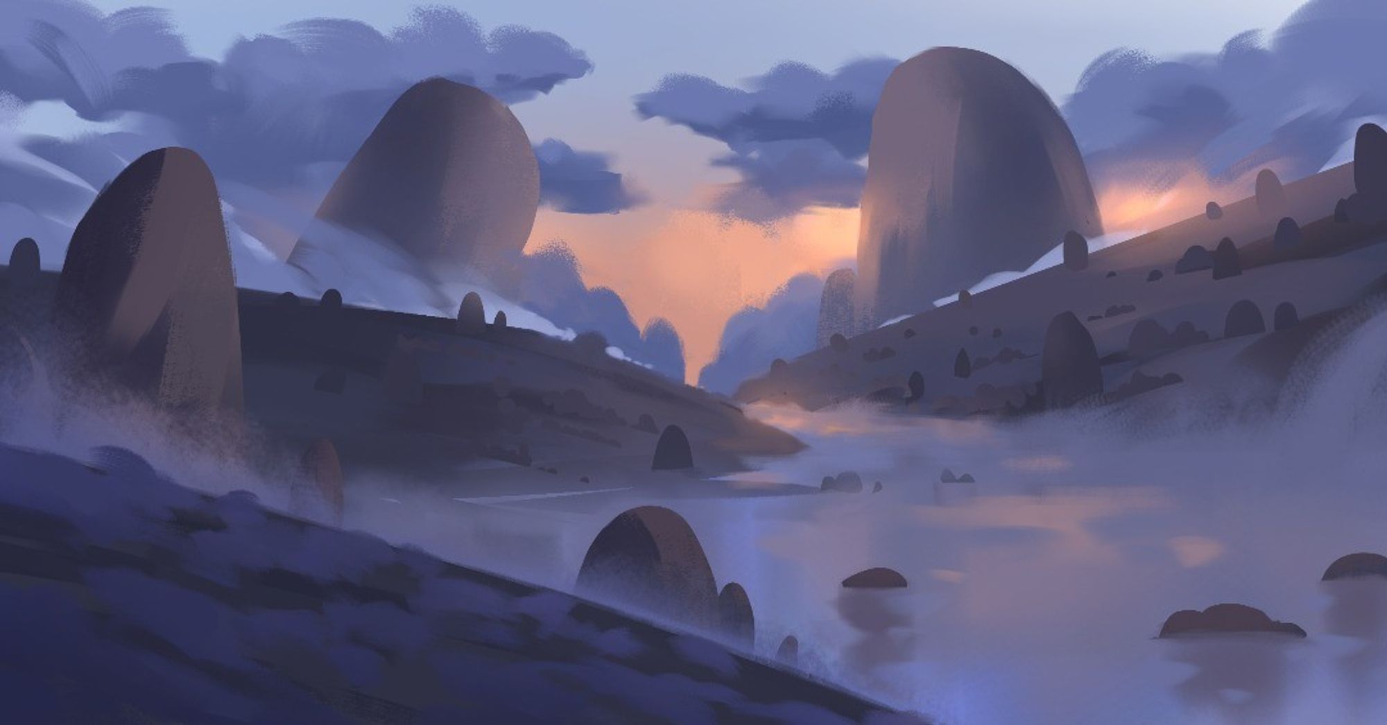 A misty landscape with a morning sun rising.  Blue and purple hills and large rock formations