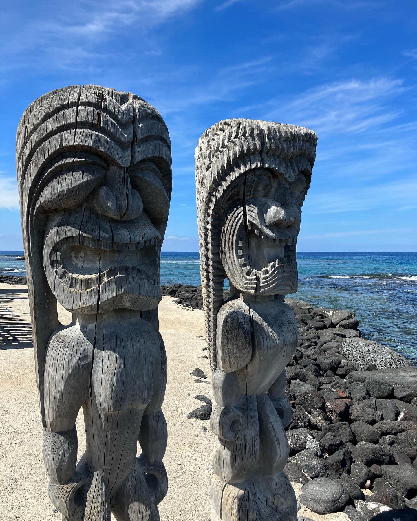 Hawaiian carved statues along the coast 