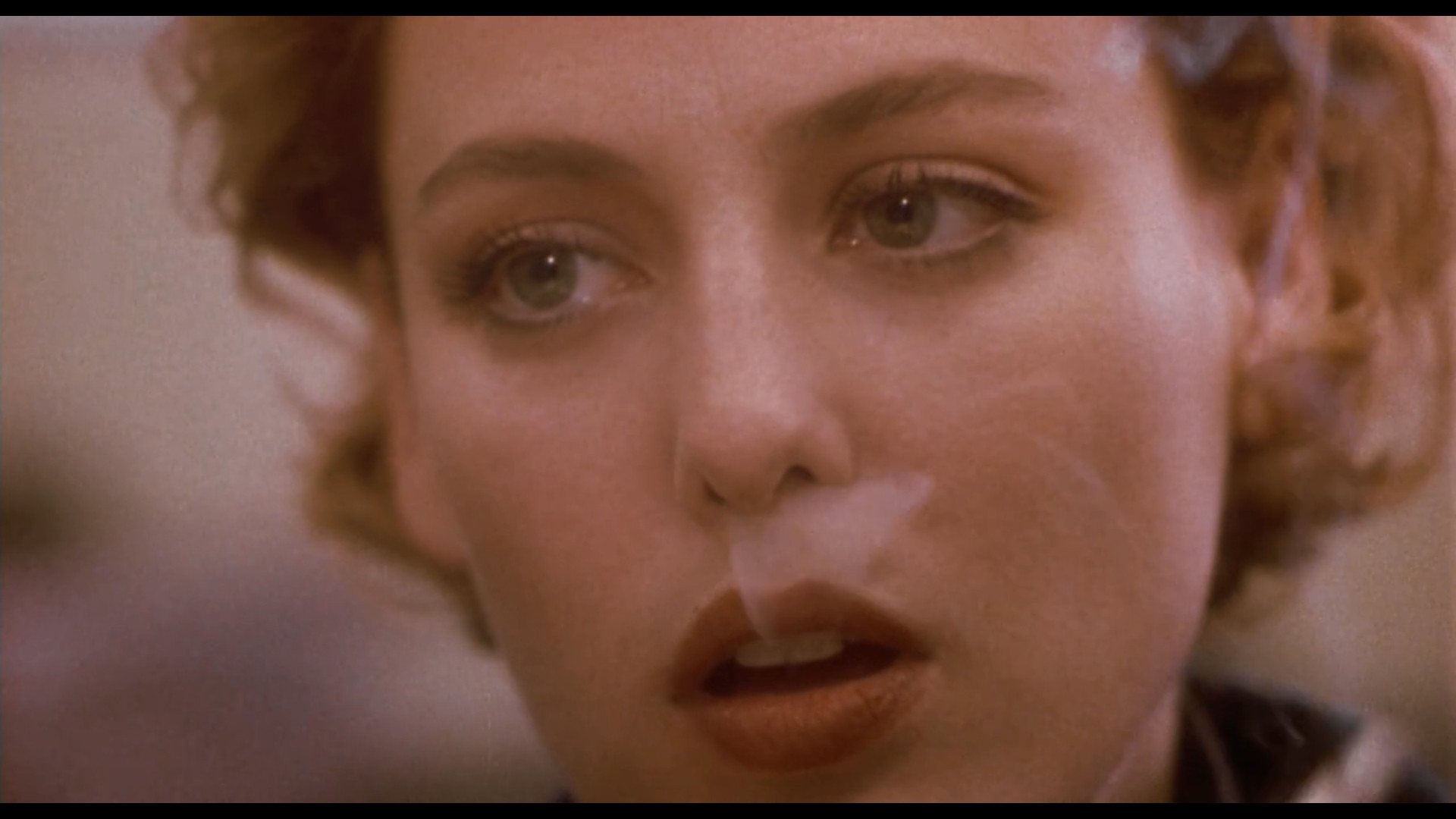 virginia madsen doing a perfect french inhale at the very start of candyman.