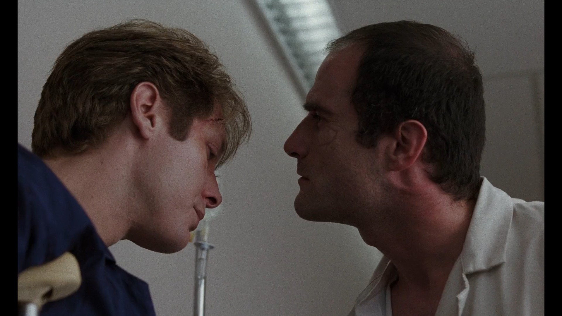 james spader submissively allowing himself to be inspected by elias koteas in crash